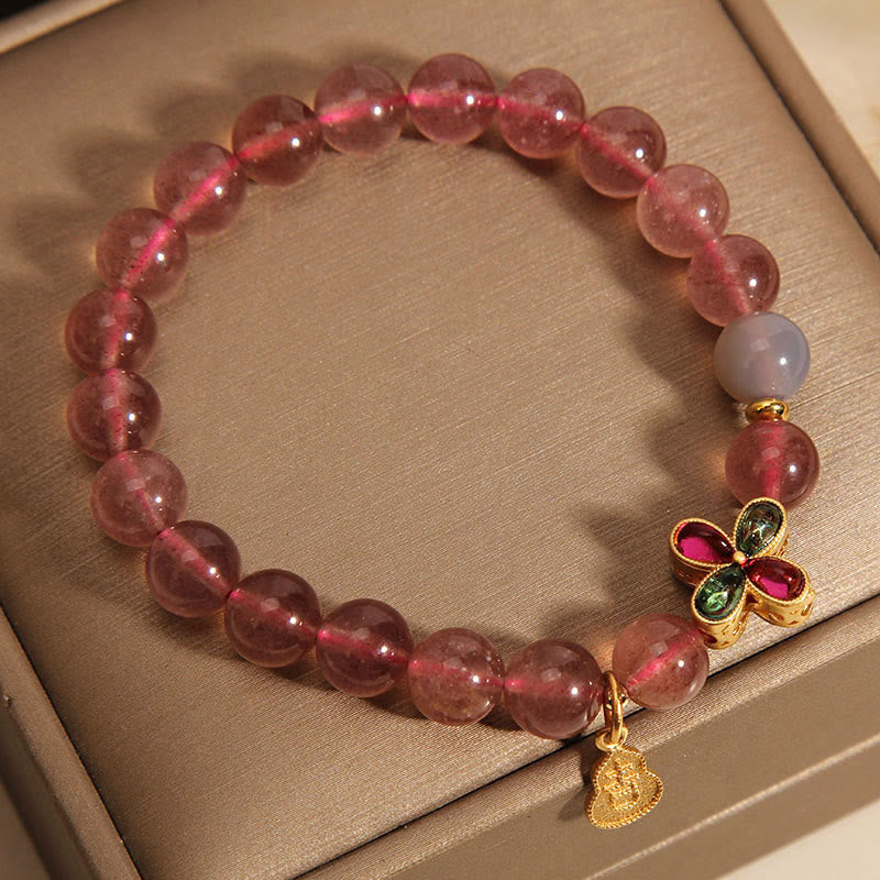 Strawberry Quartz Beaded Bracelet with Four-Leaf Clover and Wu Lou Gourd Charms