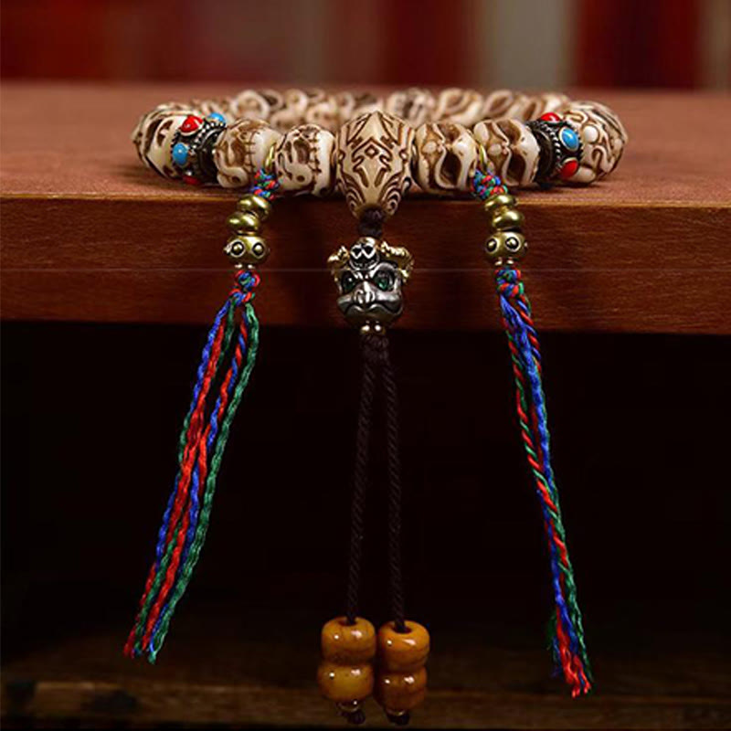 Tibetan Camel Bone Garuda Carved Protection Tassel Bracelet