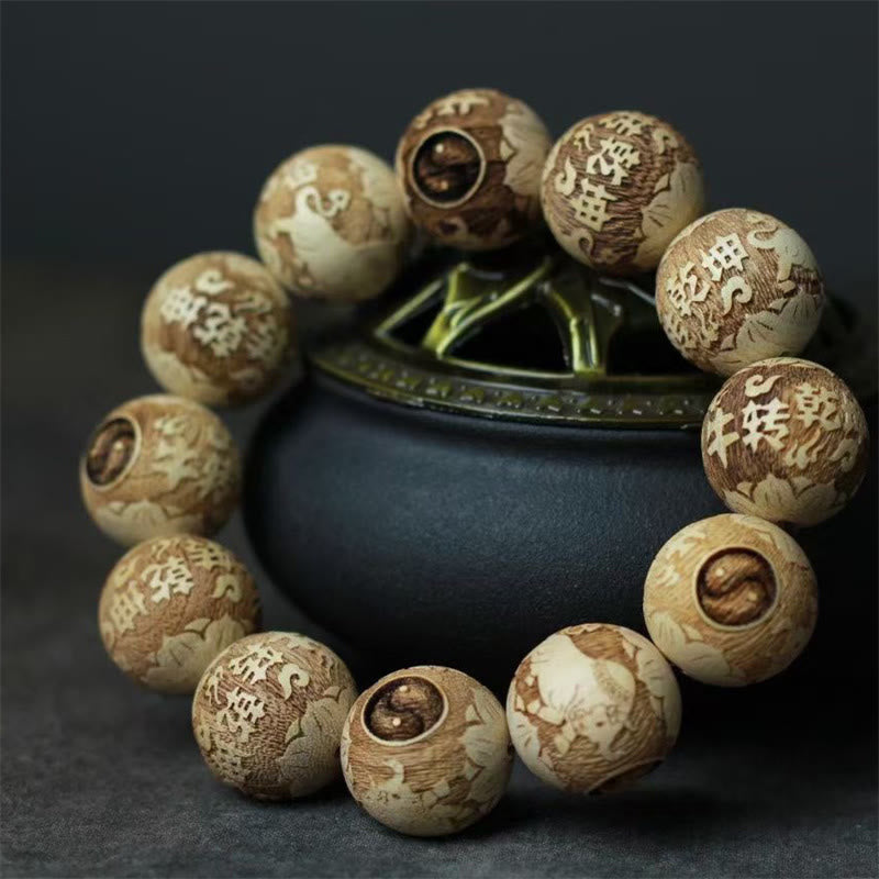Camphor Wood Yin Yang Ox Engraved Clarity Bracelet