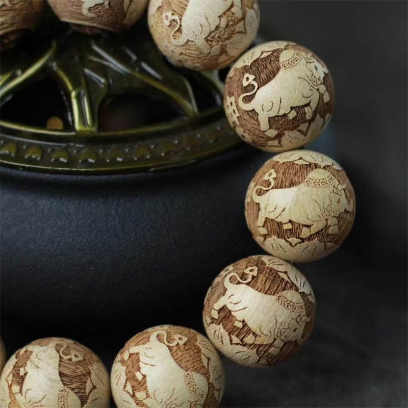 Camphor Wood Yin Yang Ox Engraved Clarity Bracelet