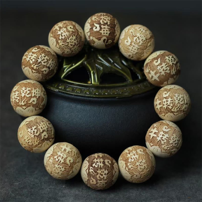 Camphor Wood Yin Yang Ox Engraved Clarity Bracelet