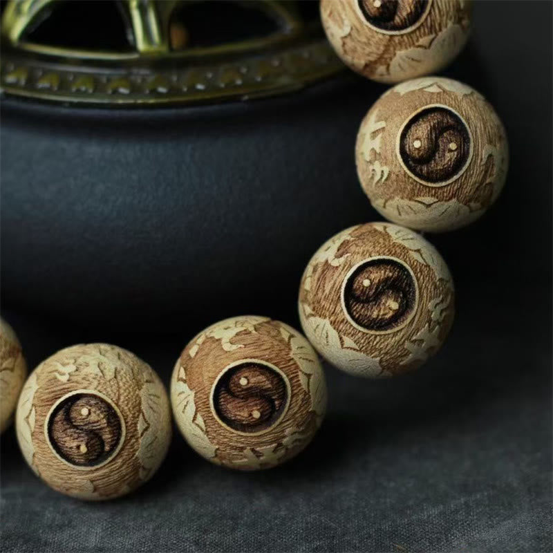 Camphor Wood Yin Yang Ox Engraved Clarity Bracelet