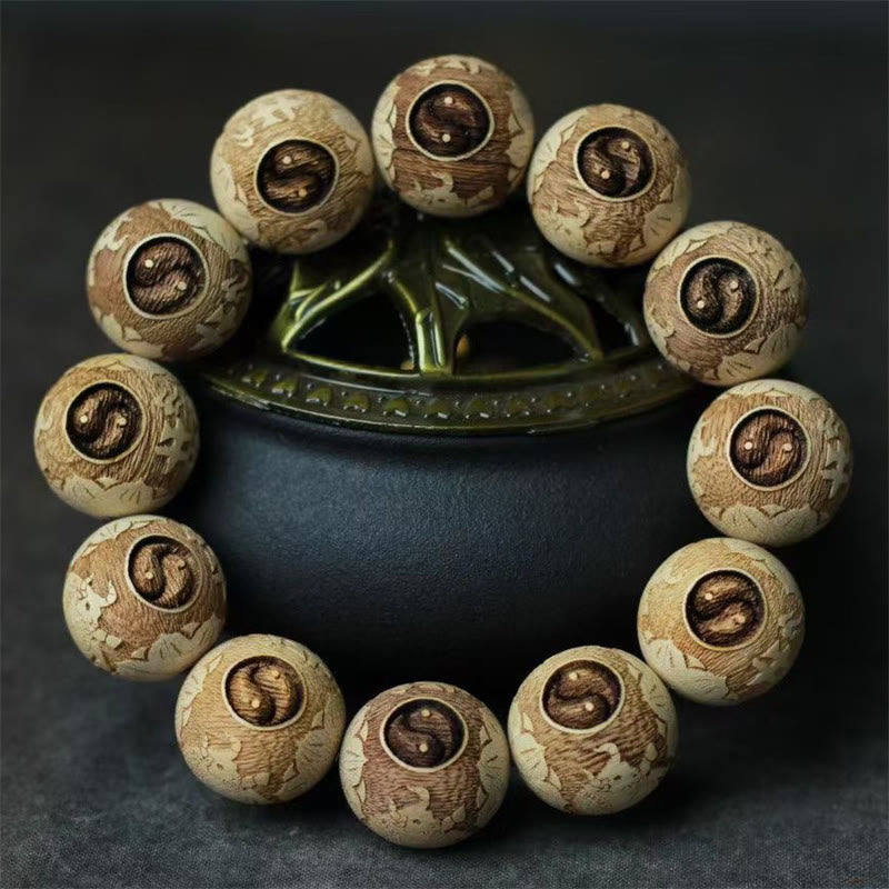 Camphor Wood Yin Yang Ox Engraved Clarity Bracelet