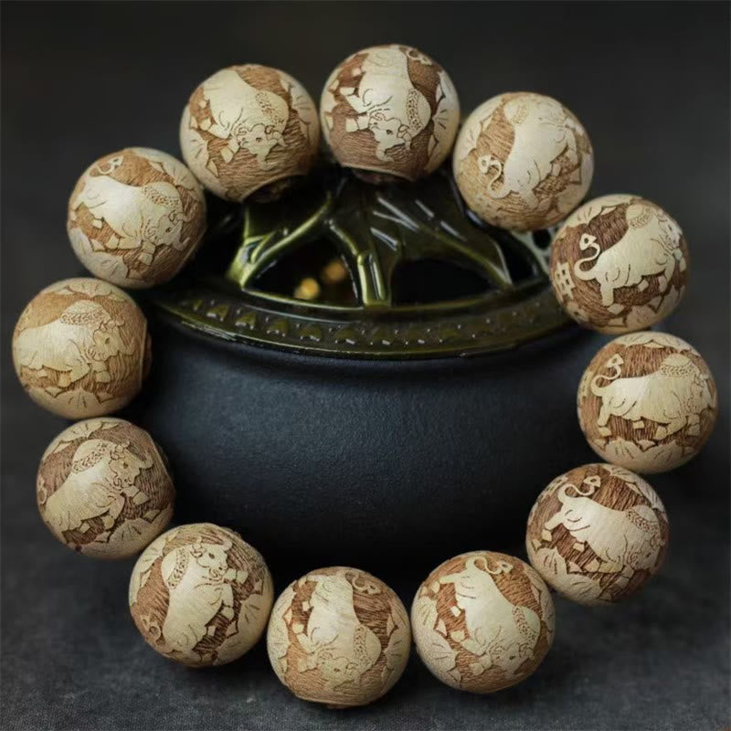 Camphor Wood Yin Yang Ox Engraved Clarity Bracelet