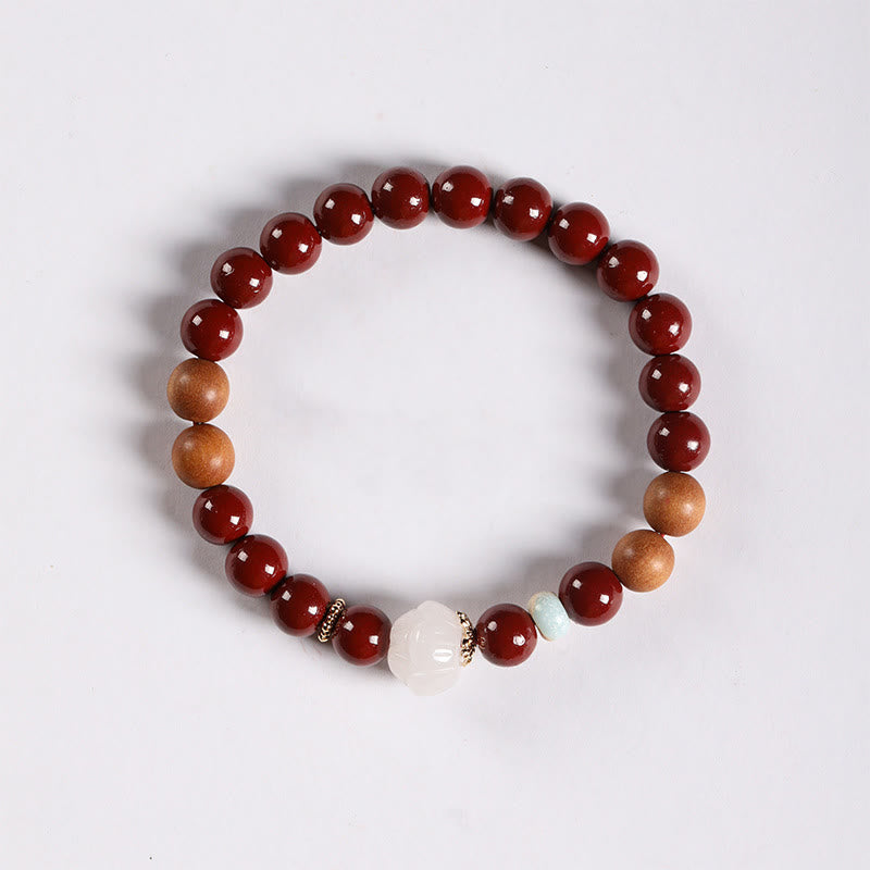 Handcrafted Sandalwood and Cinnabar Beaded Bracelet with Lotus or Fu Charm