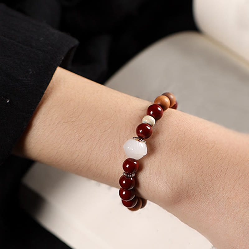 Handcrafted Sandalwood and Cinnabar Beaded Bracelet with Lotus or Fu Charm