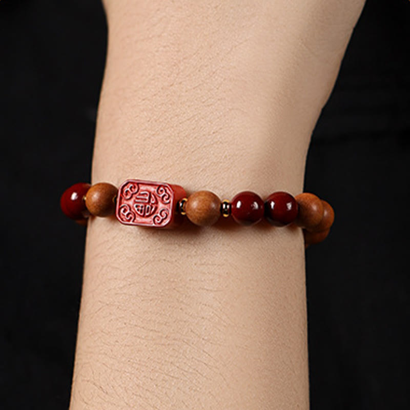Handcrafted Sandalwood and Cinnabar Beaded Bracelet with Lotus or Fu Charm