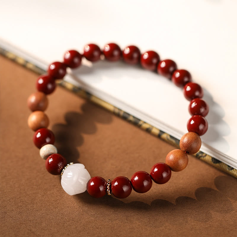 Handcrafted Sandalwood and Cinnabar Beaded Bracelet with Lotus or Fu Charm