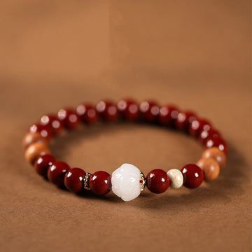 Handcrafted Sandalwood and Cinnabar Beaded Bracelet with Lotus or Fu Charm