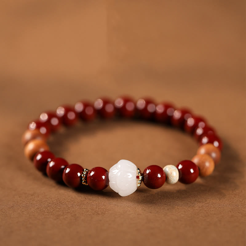 Handcrafted Sandalwood and Cinnabar Beaded Bracelet with Lotus or Fu Charm