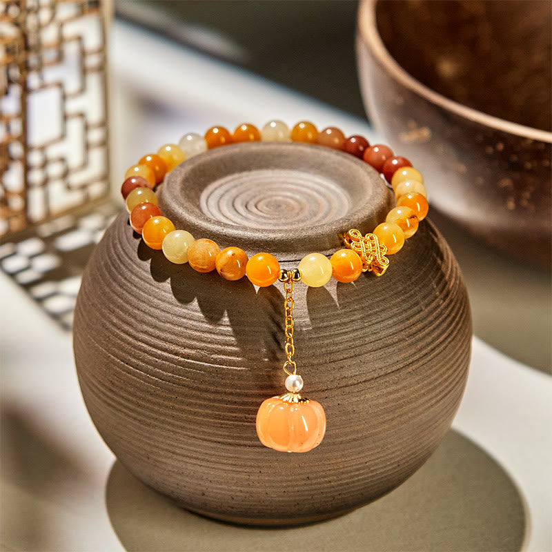 Handmade Golden Silk Jade Pumpkin Bead Bracelet with Copper Endless Knot