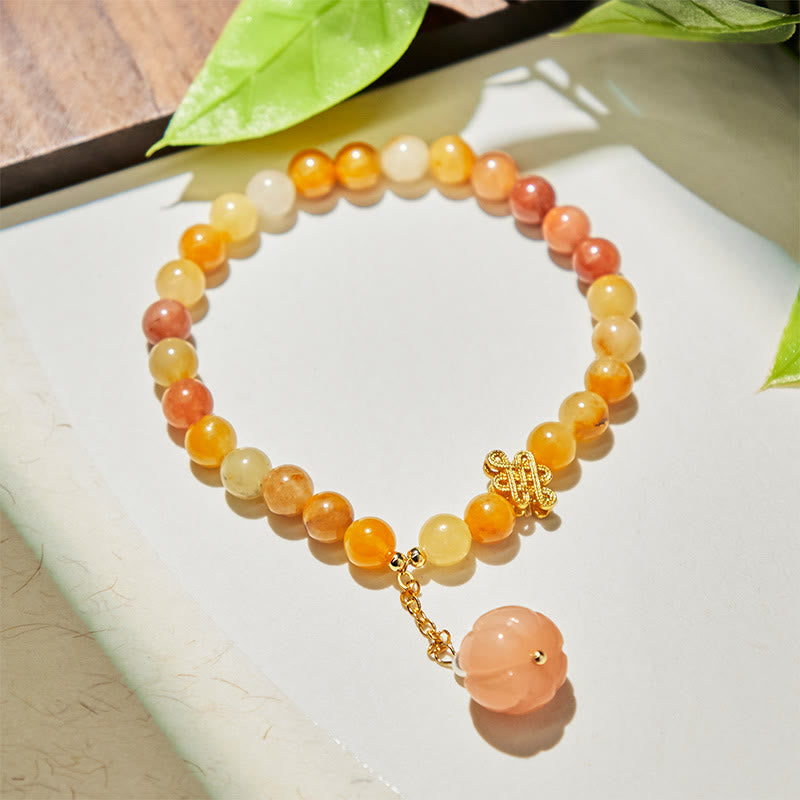 Handmade Golden Silk Jade Pumpkin Bead Bracelet with Copper Endless Knot