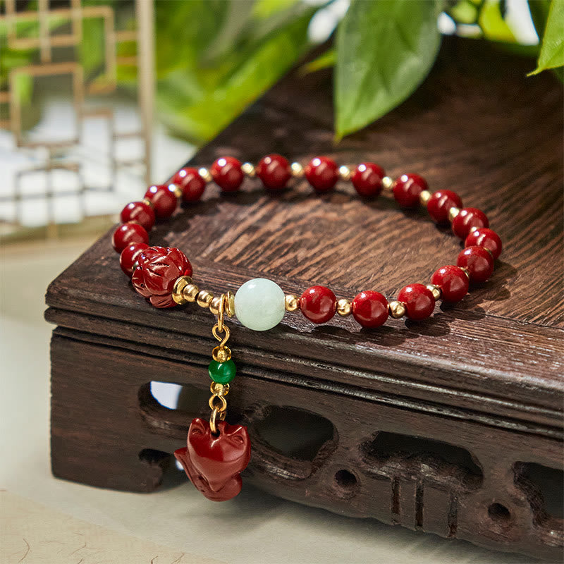 Cinnabar and Jade Lotus Fox Charm Copper Accent Bracelet
