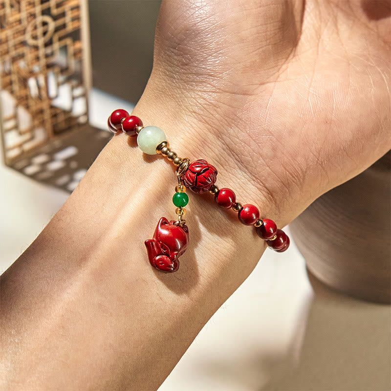 Cinnabar and Jade Lotus Fox Charm Copper Accent Bracelet
