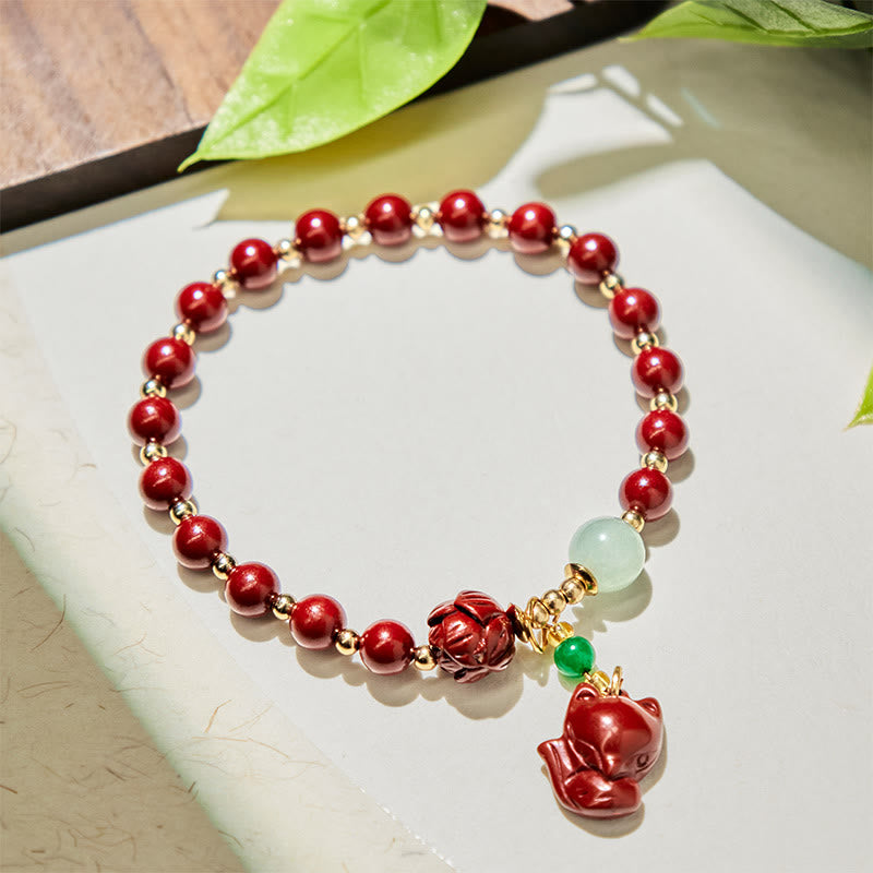 Cinnabar and Jade Lotus Fox Charm Copper Accent Bracelet