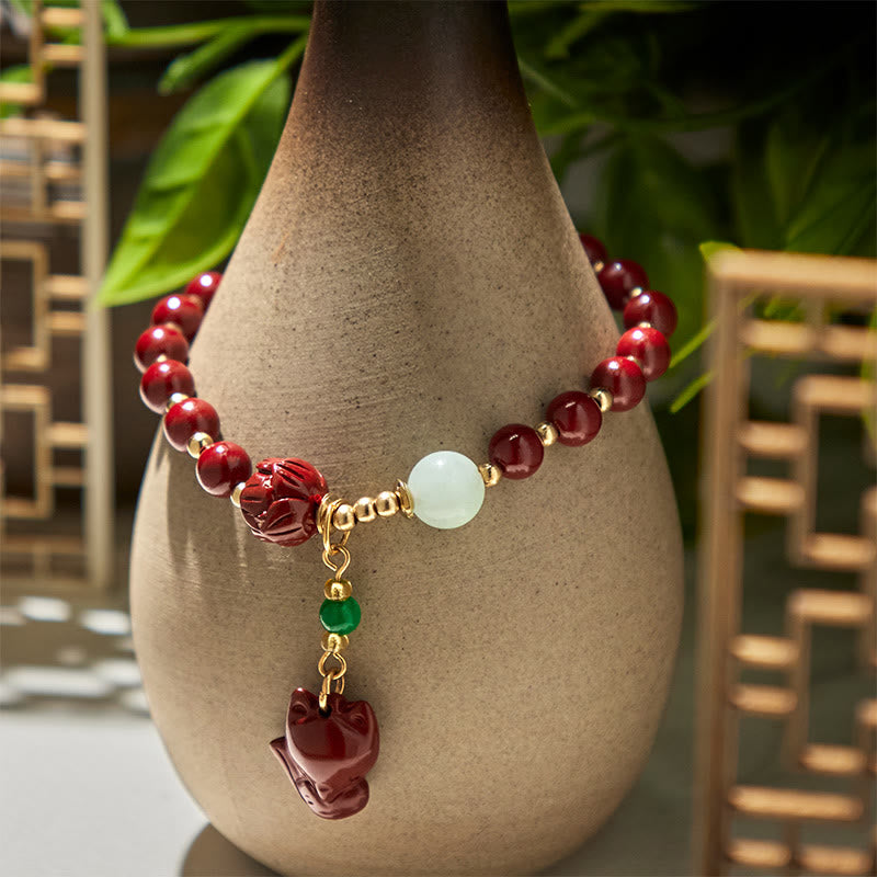 Cinnabar and Jade Lotus Fox Charm Copper Accent Bracelet