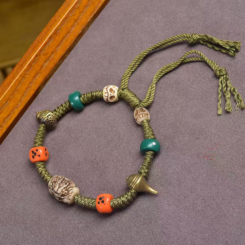 Tibetan Handmade Green Rope Bracelet with Copper Dragon Pattern Dice Beads