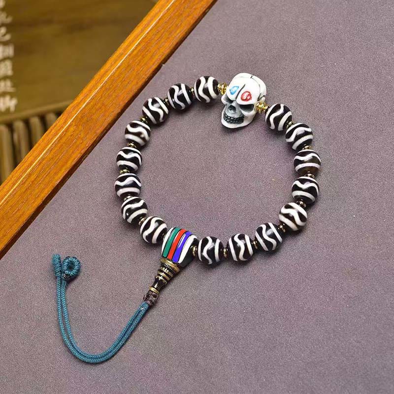 Tibetan Braided Cord Bracelet with Copper Citipati and Dzi Bead