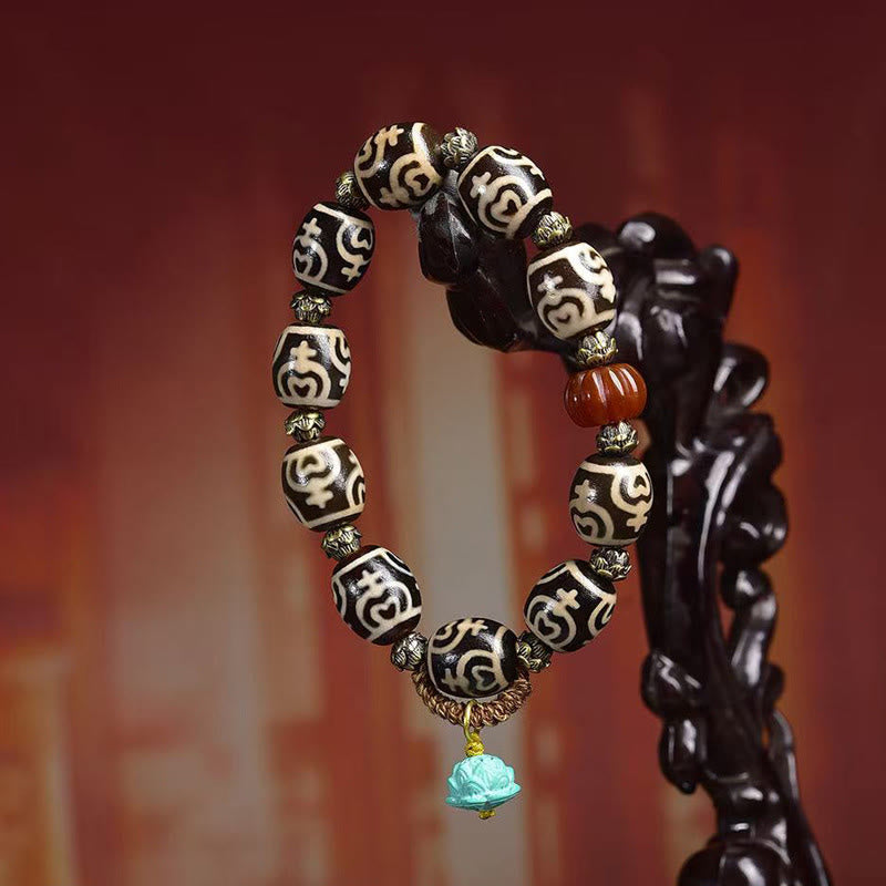 Tibetan Citipati Agate and Copper Ritual Bracelet with Treasure Vase Dzi Bead