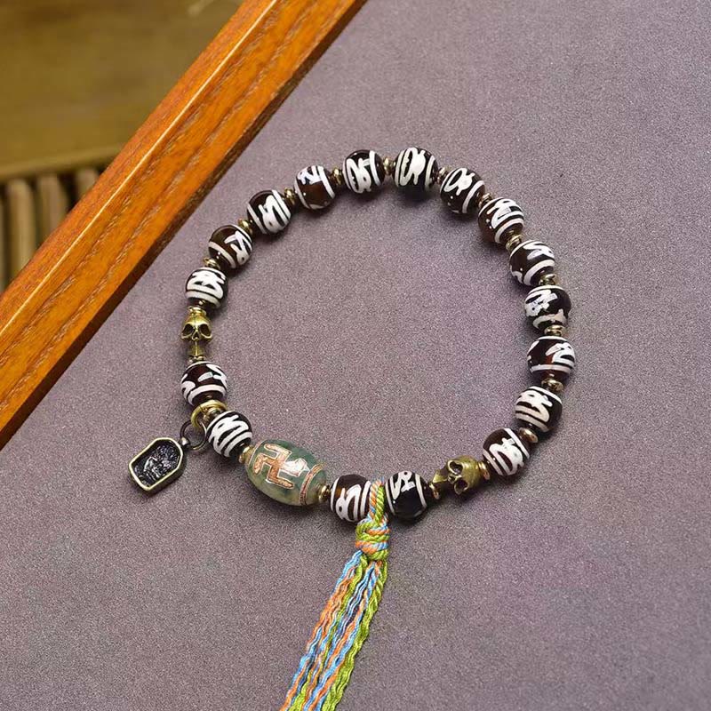 Citipati Skull Dzi Bead Agate & Copper Energy Bracelet