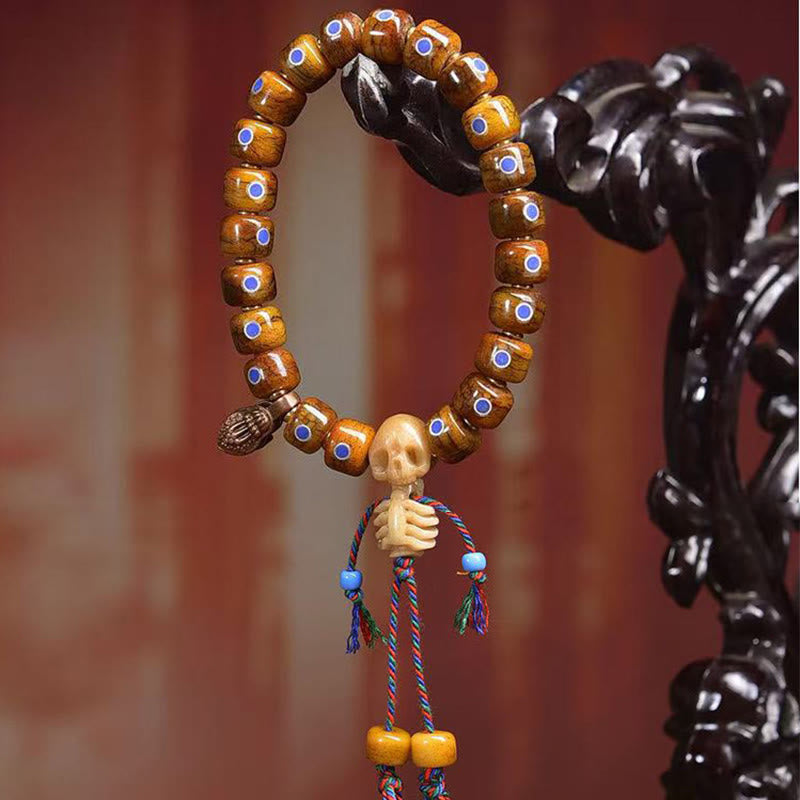 Tibetan Bone Bead Bracelet with Copper Citipati Skull Accents