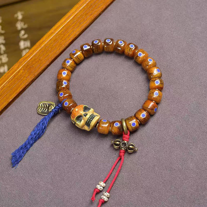 Tibetan Bone Bead Bracelet with Copper Citipati Skull Accents