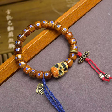 Tibetan Bone Bead Bracelet with Copper Citipati Skull Accents