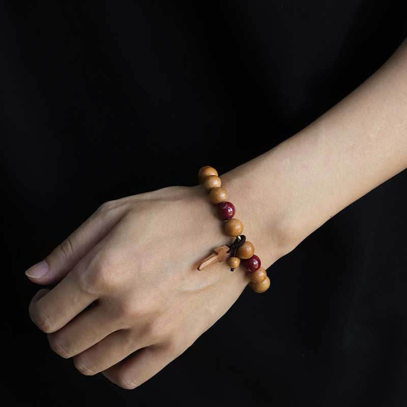 Peach Wood Beaded Bracelet with Cinnabar, Ritual Sword, Ping An Kou & Lotus Charm