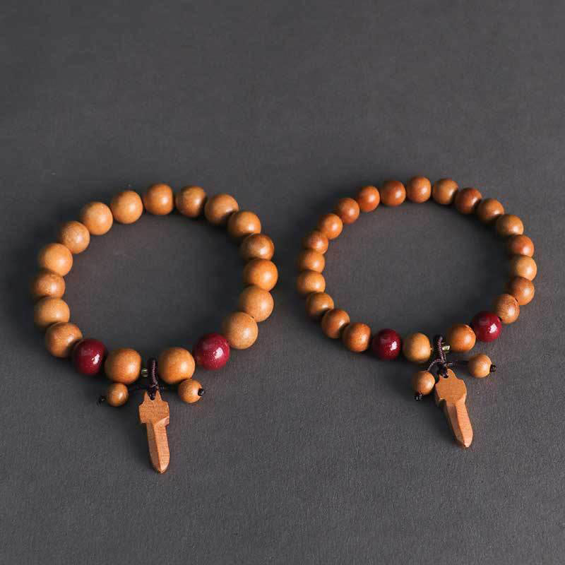Peach Wood Beaded Bracelet with Cinnabar, Ritual Sword, Ping An Kou & Lotus Charm