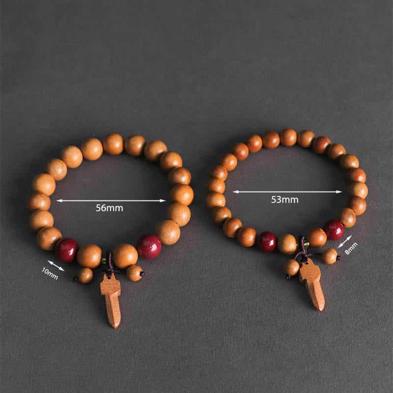 Peach Wood Beaded Bracelet with Cinnabar, Ritual Sword, Ping An Kou & Lotus Charm