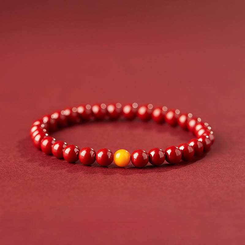 Natural Amber and Cinnabar Beaded Bracelet with Lotus Symbol