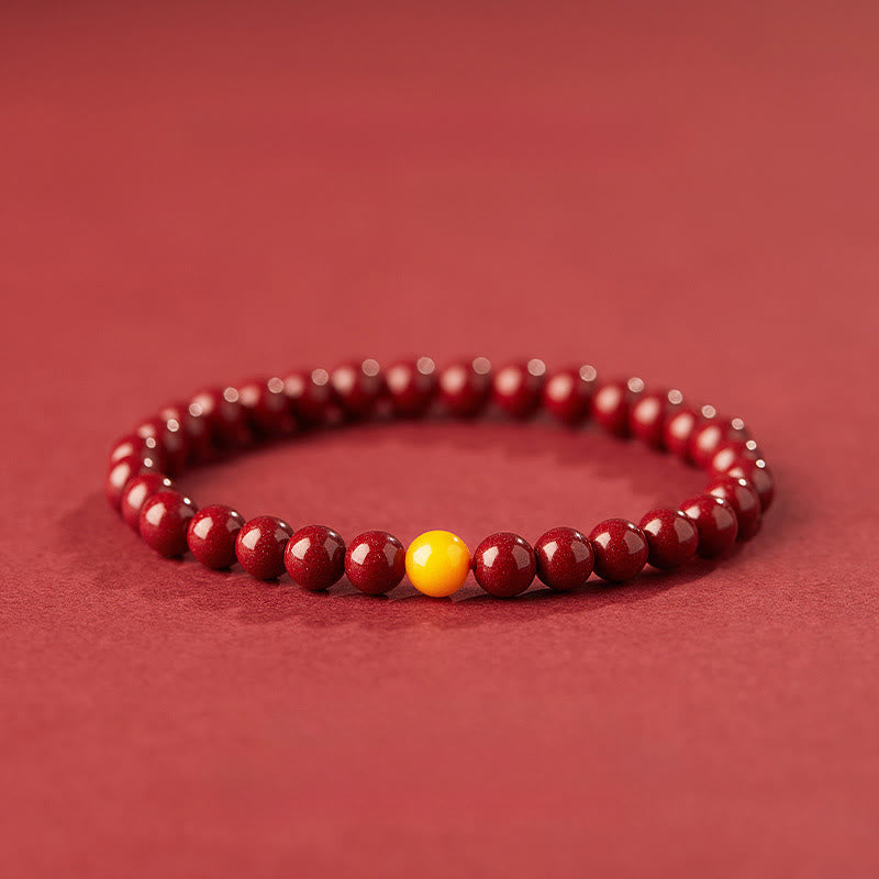 Natural Amber and Cinnabar Beaded Bracelet with Lotus Symbol