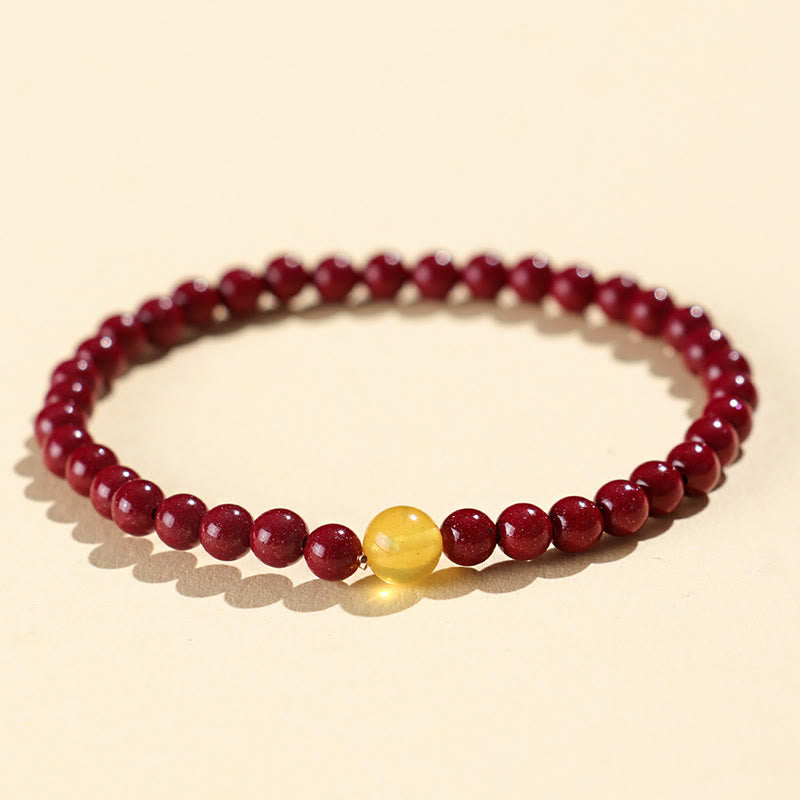 Natural Amber and Cinnabar Beaded Bracelet with Lotus Symbol