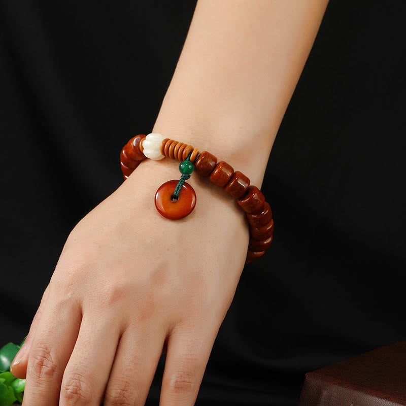 Bodhi Seed Bone Bead Bracelet with Ping An Kou & Lotus Designs