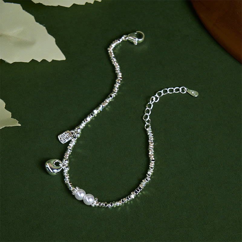 Sterling Silver & Copper Pearl Bracelet with Fu Purse and Koi Fish Charms