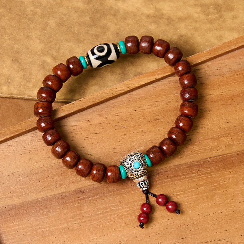 Handcrafted Bone Beads Bracelet with Three-Eyed Dzi and Vajra Elements
