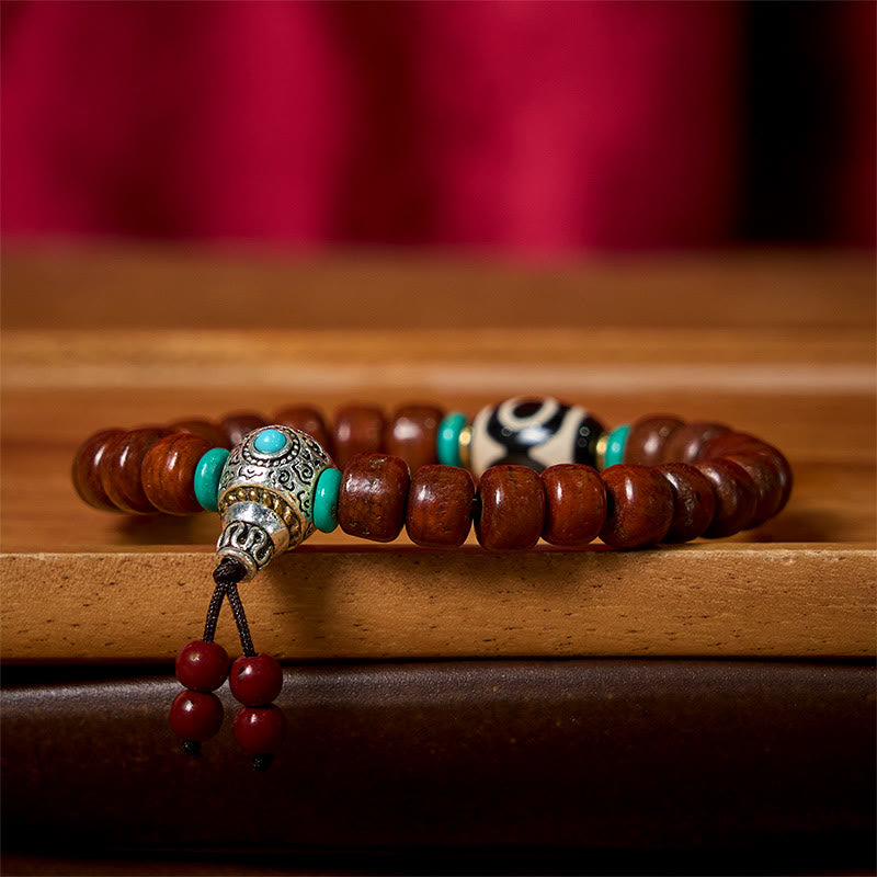 Handcrafted Bone Beads Bracelet with Three-Eyed Dzi and Vajra Elements