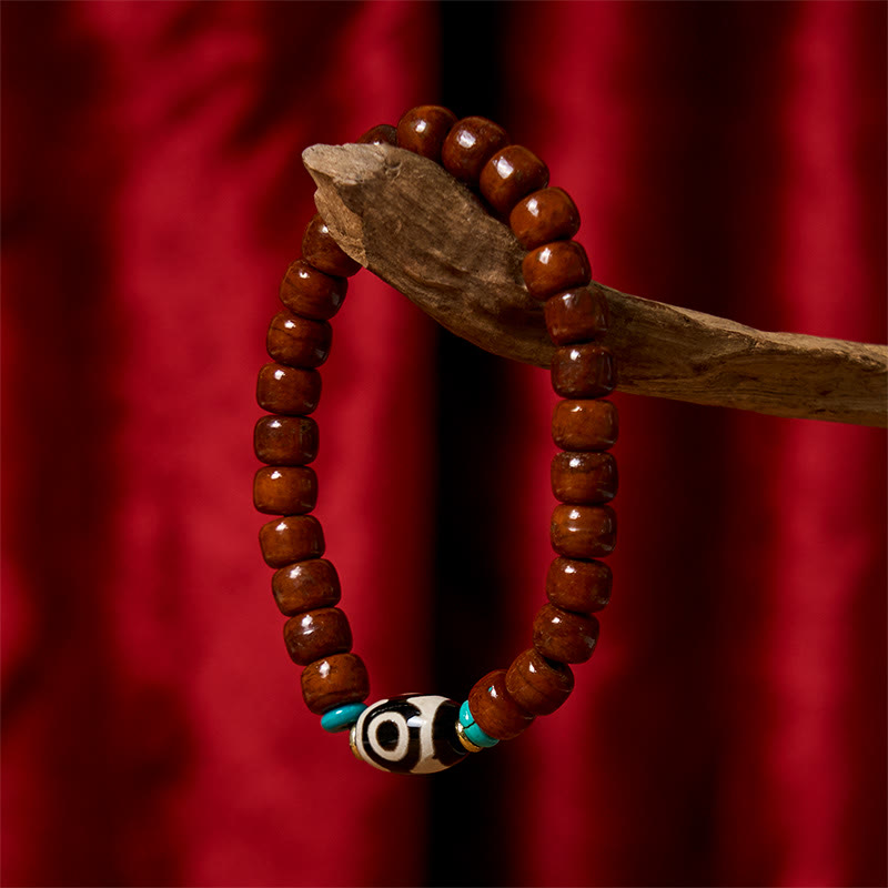 Handcrafted Bone Beads Bracelet with Three-Eyed Dzi and Vajra Elements