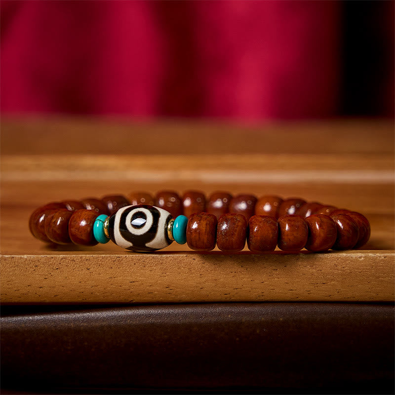 Handcrafted Bone Beads Bracelet with Three-Eyed Dzi and Vajra Elements