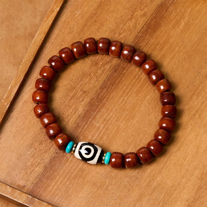 Handcrafted Bone Beads Bracelet with Three-Eyed Dzi and Vajra Elements
