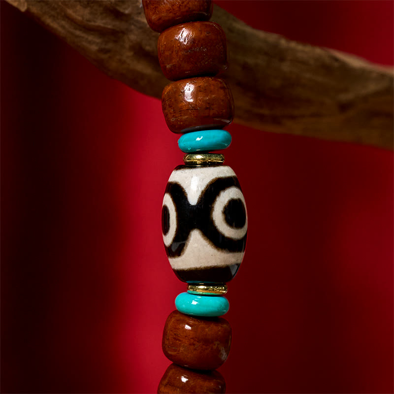Handcrafted Bone Beads Bracelet with Three-Eyed Dzi and Vajra Elements