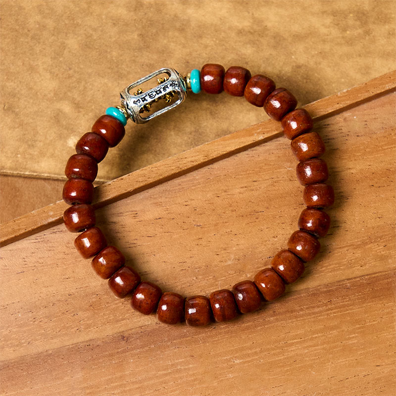 Handcrafted Bone Beads Bracelet with Three-Eyed Dzi and Vajra Elements