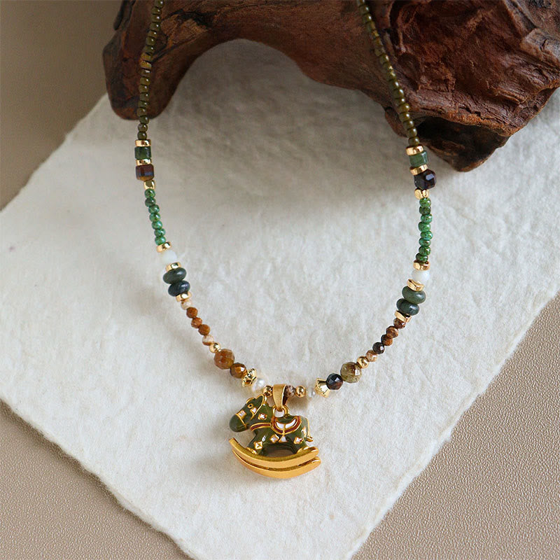 “Year of the Horse” Multi-Material Pendant Necklace with Copper, Green Garnet, Tiger Eye, Olive Wood, Pearl