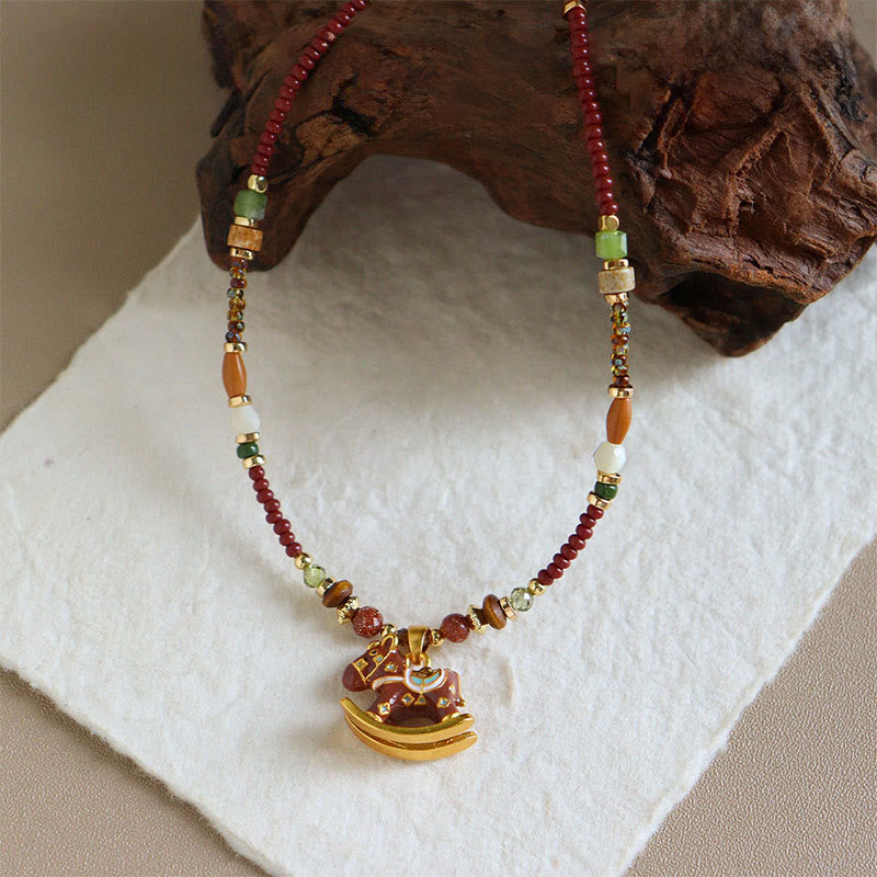 “Year of the Horse” Multi-Material Pendant Necklace with Copper, Green Garnet, Tiger Eye, Olive Wood, Pearl