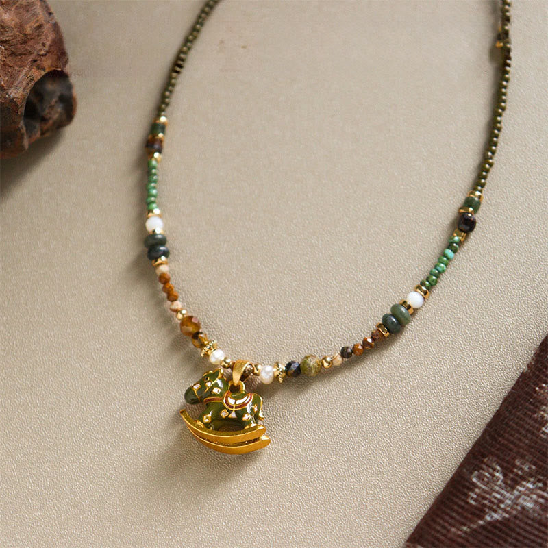 “Year of the Horse” Multi-Material Pendant Necklace with Copper, Green Garnet, Tiger Eye, Olive Wood, Pearl