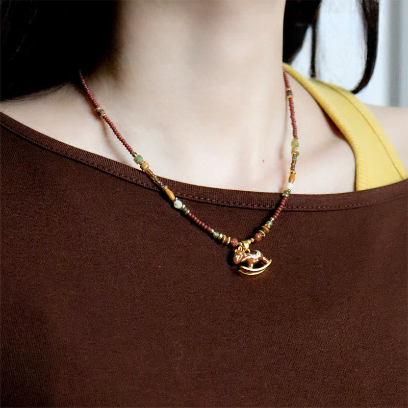 “Year of the Horse” Multi-Material Pendant Necklace with Copper, Green Garnet, Tiger Eye, Olive Wood, Pearl