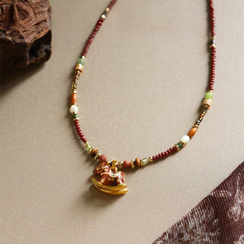 “Year of the Horse” Multi-Material Pendant Necklace with Copper, Green Garnet, Tiger Eye, Olive Wood, Pearl