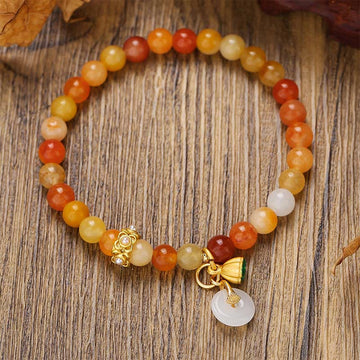 Golden Silk Jade Peace Buckle (Ping An Kou) Centering Bracelet