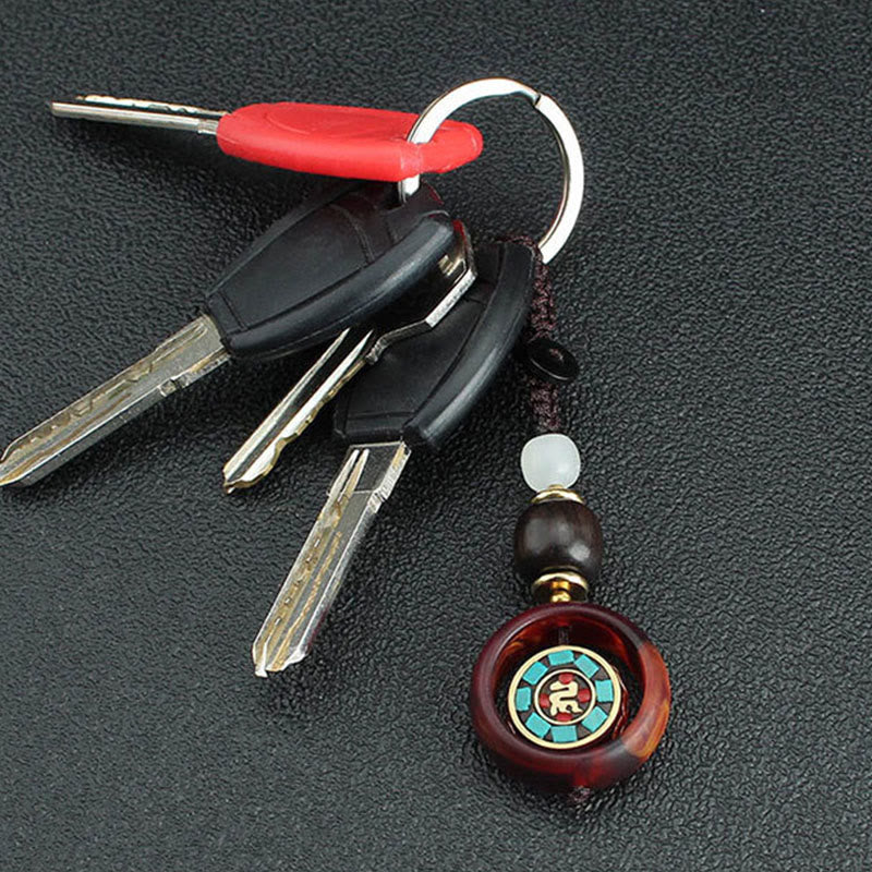 Ebony Wood Rotatable Keychain with Symbolic Patterns for Mindful Reflection