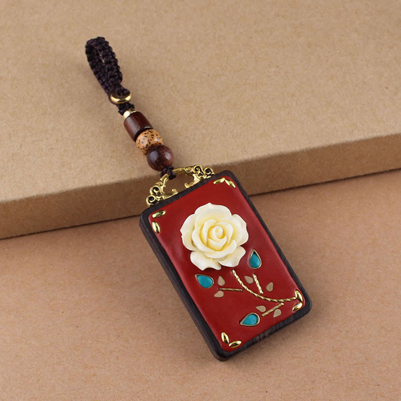 Hand-Carved Ebony Wood Red String Keyring with Symbolic Motifs